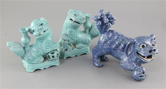 A pair of Chinese jos-stick holders, and a similar figure